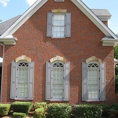 Custom raised panel shutters with transem top