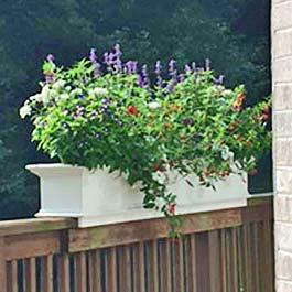 custom flower box on wood deck rail