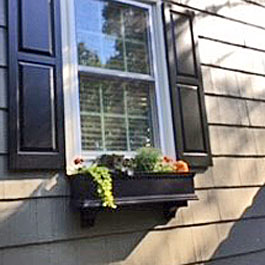 Small black window box with fall display