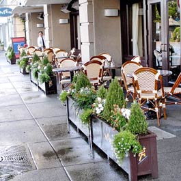 black restaurant planters outside