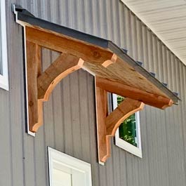 pitched roof with custom cedar brackets