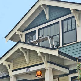 large wood brackets on craftsman roofline