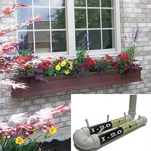 Self Watering reservoir system for window boxes holds up to a gallon of water