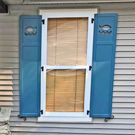 Composite Outdoor Shutters with Fish Cutout