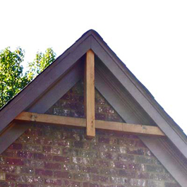 rustic cedar beam in gable unpainted