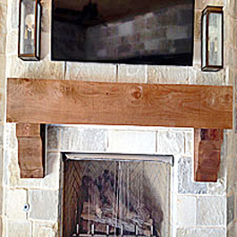 large cedar mantel corbels under large cedar mantel