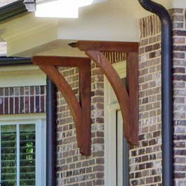 red cedar porch brackets under portico