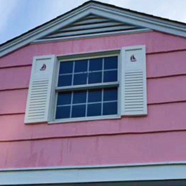 sail boat cutout shutters on beach house