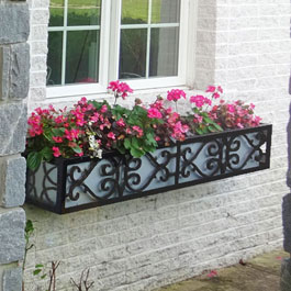 wrought iron window box with scrolls and silver liner