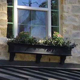 6' black window box on stone 