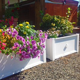 white floor planter with decorative diamond