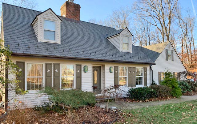 Exterior Cutout Shutters on Cottage Home